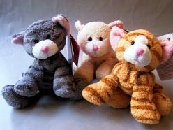 767 -Peluche tigrée " style peau de pêche"